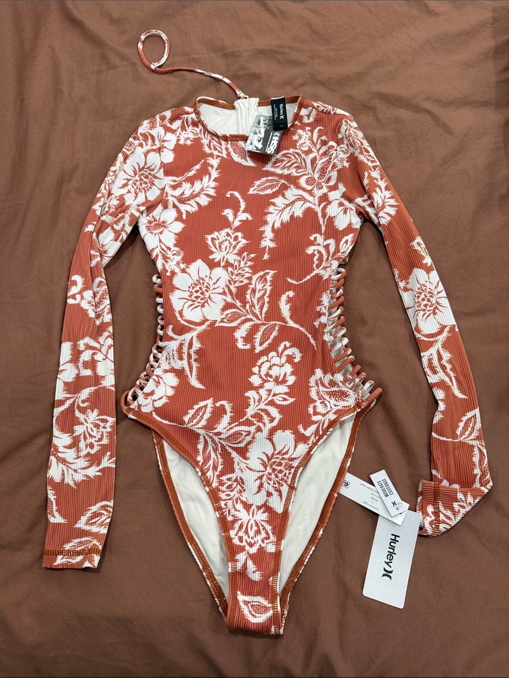 Hurley Rust and White Floral Long Sleeve One-Piece Swimsuit